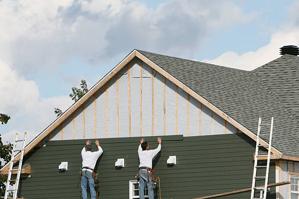 Professional Siding Installation technician working in Highland, IN